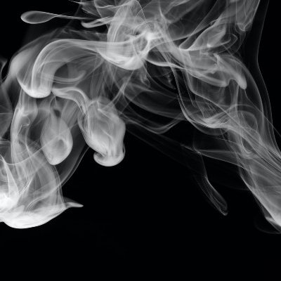 Cigarette smoke on black background.